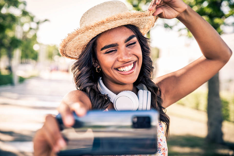 Woman of color taking a selfie