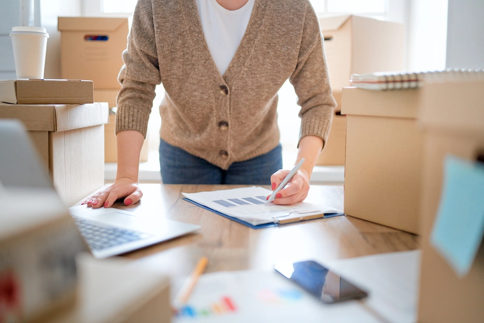 Person taking inventory showing a brick-and-mortar to ecommerce switch