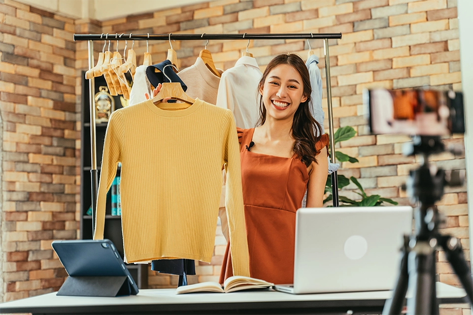 Woman doing a clothing product review in an example of influencer marketing best practices