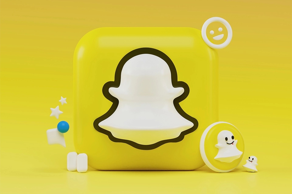 3D Snapchat logo in front of a yellow background