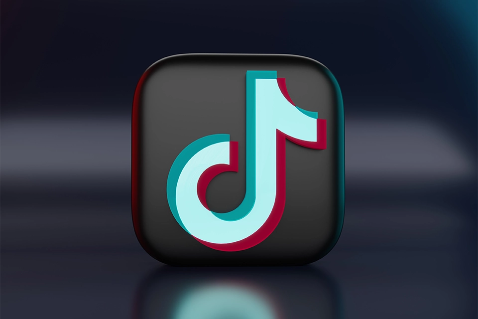 TikTok icon on a dark background